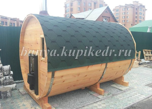 Tonneau de sauna avec foyer extérieur