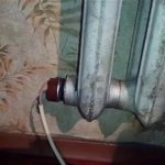 Radiateur de chauffage en fonte avec élément chauffant intégré