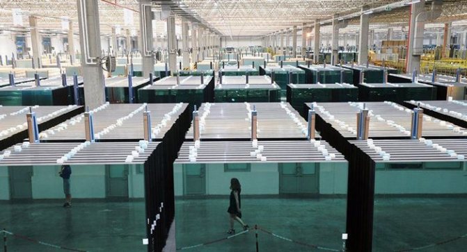 Photo: la production de verre moderne totalise des millions de m2