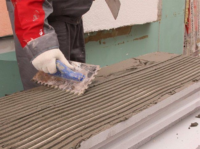 Comment fixer du penoplex de 20 mm sur un mur de briques et des cloisons sèches
