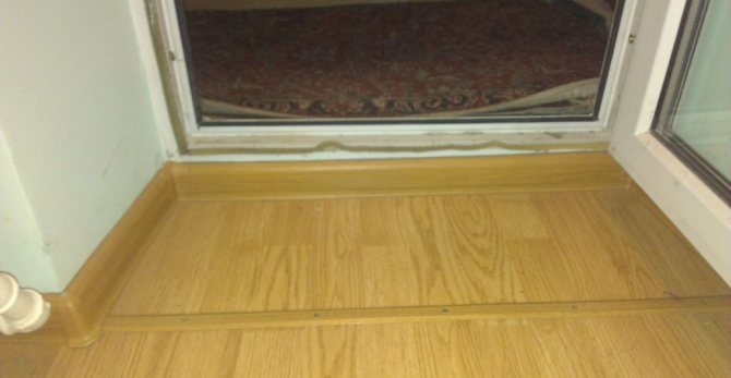 Finition seuil de balcon avec stratifié