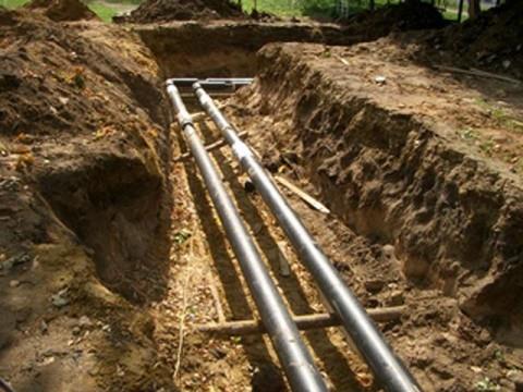 laying heating pipes in the ground